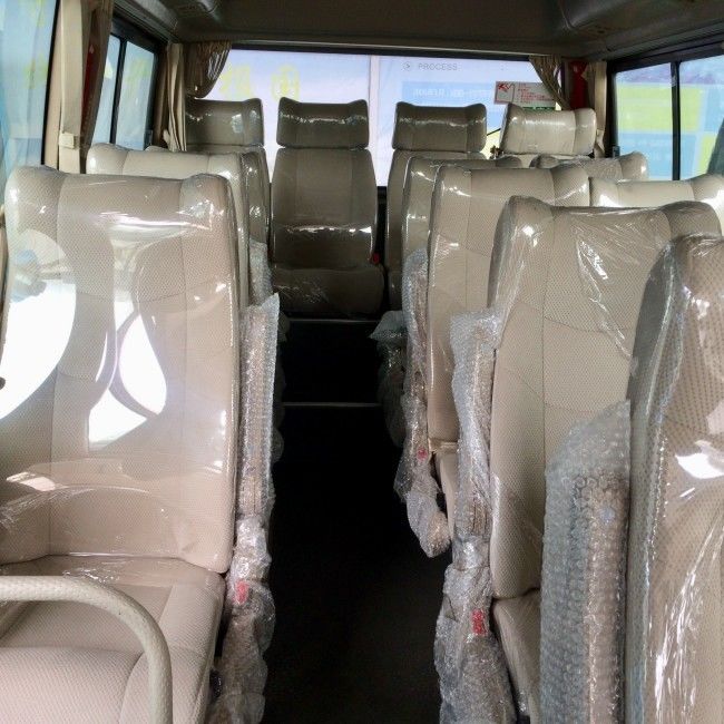 7m Diesel Coaster Buses 25 Seater Manual 5 Gears For public transportation.